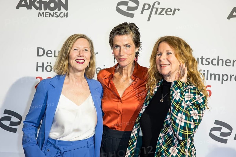 Petra Zieser, Julia Bremermann and Marion Kracht in front of the German Audio Film Awards ceremony at the Colosseum cinema in Berlin on 24.03.2026