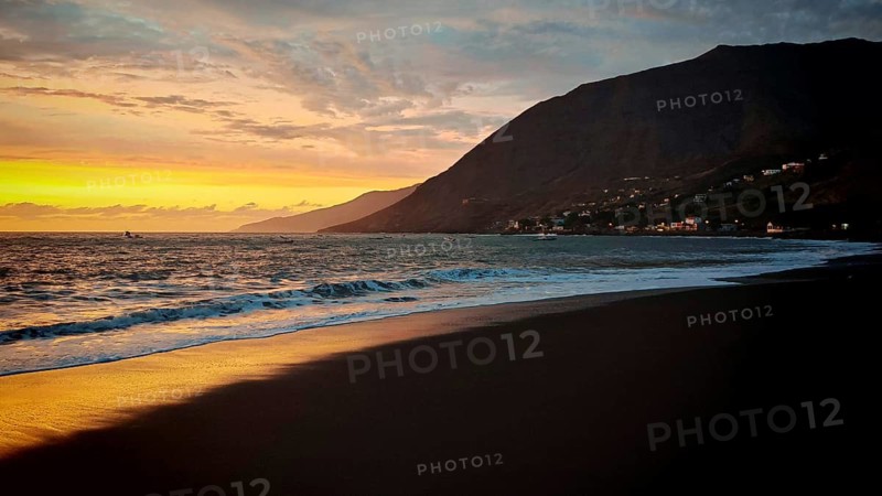 Calmest twilight atmosphere at sunset over sea and mountains, beach with volcanic sand, hiking, Tarrafal de Monte Trigo, Santo Antao, Cabo Verde, Cape Verde, Cape Verde
