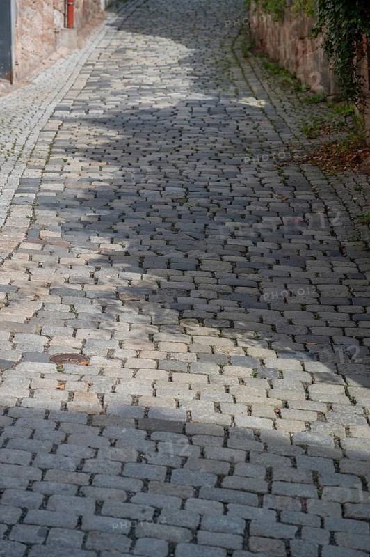 Street paving with basalt stones in the old town centre, Kulmbach, Upper Franconia, Bavaria, Germany