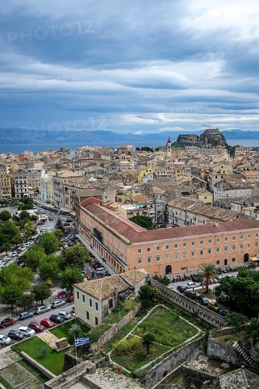 Corfu Town, Corfu, Greece, City overview Corfu Town with the Greek Orthodox Church of Agios Spiridon and the New Fortress. Back mainland Albania