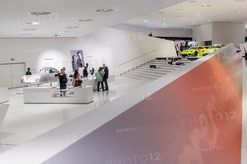 Porsche Museum Stuttgart-Zuffenhausen. Ferdinand Porsche, Ferry Porsche. Busts of legendary designers. Before that, Porsche Type 64, built in 1939. The automotive museum of Dr. Ing. h.c. F. Porsche AG shows racing cars and iconic cars from automotive history. interior view. Stuttgart, Baden-Württemberg, Germany
