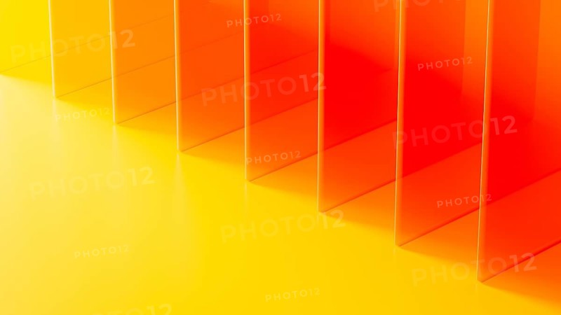 Striking formation of transparent crystals creates an abstract visual in bright warm hues, emphasizing depth and light play across surfaces