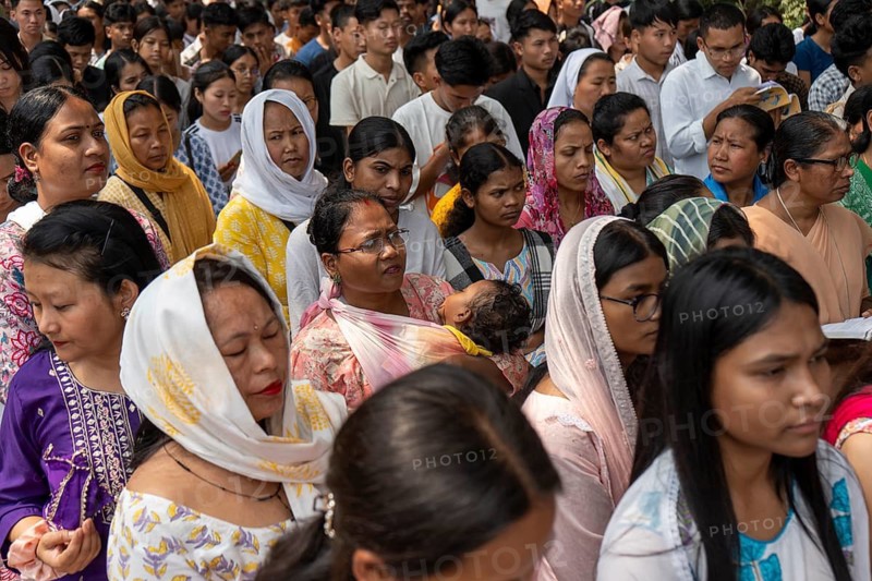 Catholic devotees recite prayers as they perform a re-enactment of the crucifixion of Jesus Christ during a Good Friday procession on April 3, 2026 in Guwahati, India. Indian Catholics are celebrating Good Friday along with Roman Catholics around the world, marking the day Jesus Christ was crucified