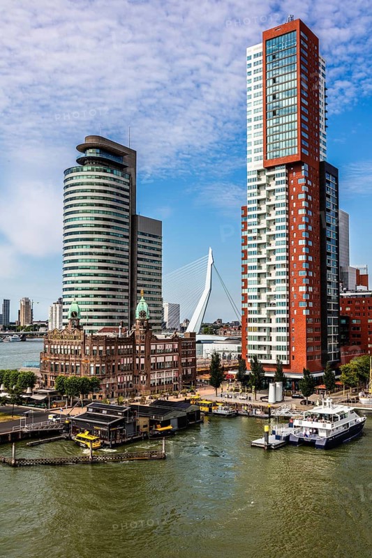 Hotel New York, historic art nouveau building on the Kop van Zuid, former headquarters of the Holland America Line, thousands of emigrants once left this place for North America, modern architecture in the city panorama, Rotterdam, Netherlands
