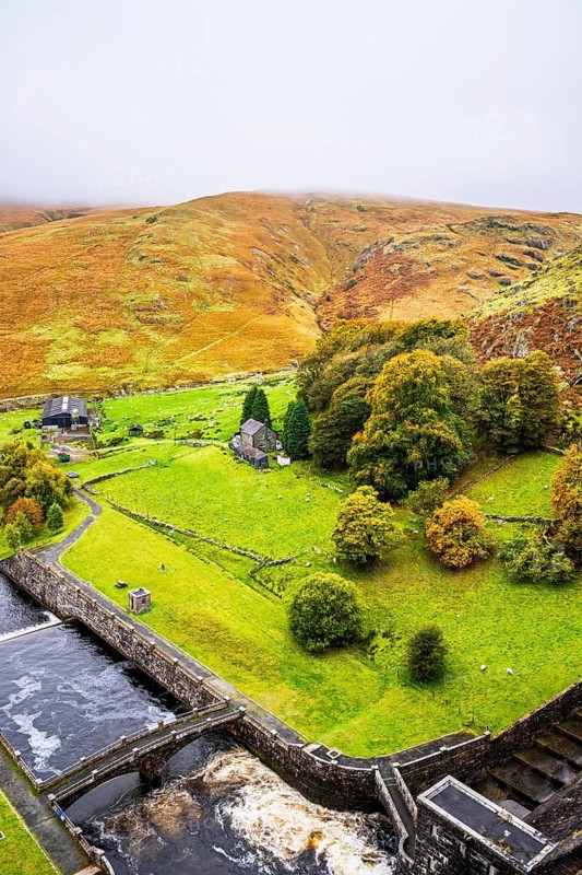 Autumn colors over Claerwen Dam, Claerwen Valley, Elan Valley Reservoir, Rhayader, Powys, Wales, UK