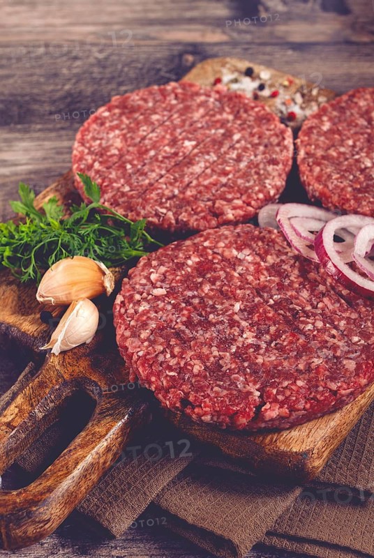 Raw cutlets, for burgers, minced meat, handmade, homemade, with spices, top view, no people