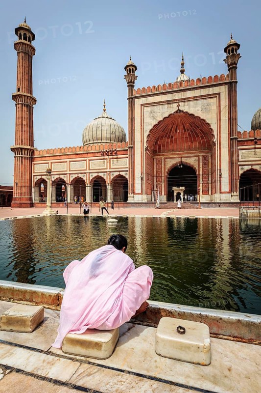 DELHI, INDIA, JUNE 24, 2012: Woman in Jama Masjid, the largest mosque in India. Delhi, India