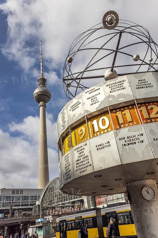 View of Alexanderplatz in Berlin. Landmark world clock and a tram. TV tower. Berlin, Germany