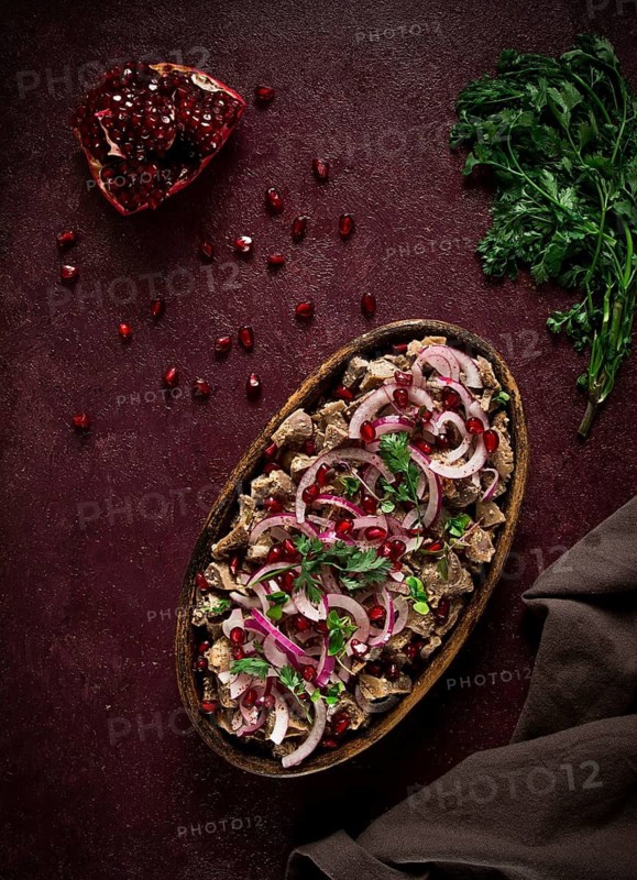 Kuchmachi, Traditional Georgian cuisine, chicken giblets appetizer, with spices and pomegranate seeds, on ketsi, no people, homemade