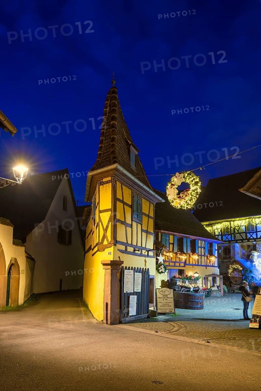 Houses illuminated and decorated for Christmas, Christmas market, blue hour, Eguisheim, Haut-Rhin department, Grand Est region, Alsace, France