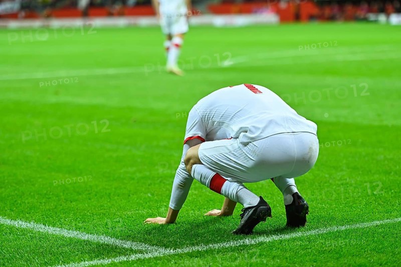 Footballer after missing shoot during soccer match in Warsaw, Poland