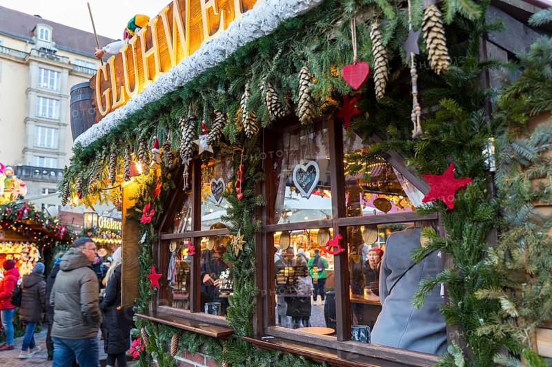 Lovingly decorated market stand with window at the Striezelmarkt Christmas market, Dresden, Saxony, Germany