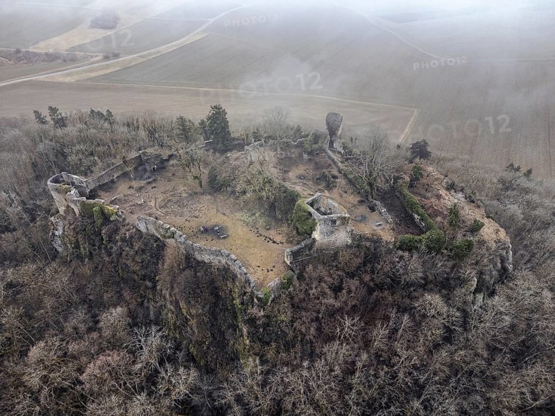Aerial view of the ruins of Mägdeberg Castle in Hegau on a foggy winter day, Mühlhausen-Ehingen, district of Konstanz, Baden-Württemberg, Germany