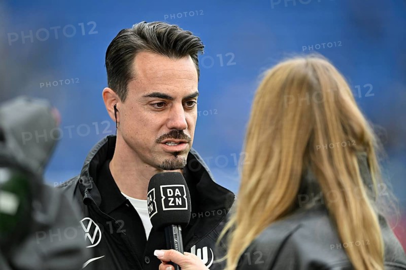 DAZN presenter reporter Sylvia Walker, portrait in interview microphone micro logo Diego Benaglio supervisory board member VfL Wolfsburg, soccer Bundesliga, PreZero Arena, Sinsheim, Baden-Württemberg, Germany