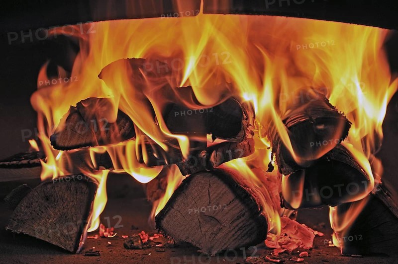 Burning beech wood in a tarte flambée oven, Ringsheim, Baden-Württemberg, Germany