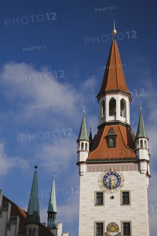 Bell and clock tower of the Altes Rathaus Old City Hall with traditional terracotta ceramic tiled roofs, Munich, Bavaria, Germany