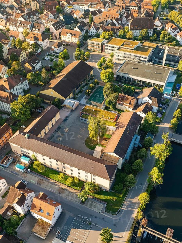 Close-up of an urban area with a river, a bridge and many buildings, Nagold, Black Forest, Germany