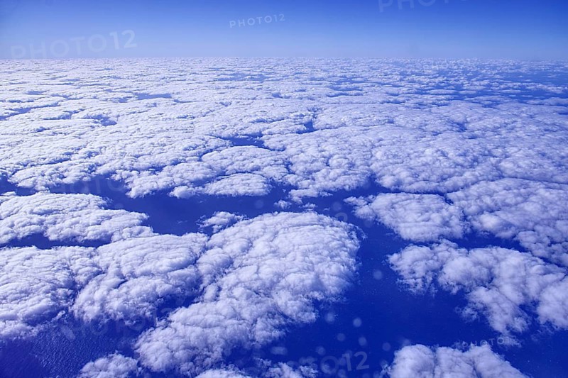 Approach to Arrecife with aerial views of a sea of clouds under a blue sky, Lanzarote