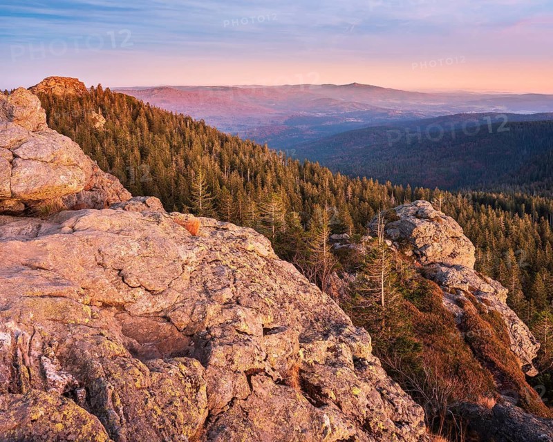 Sunset on the summit of the Großer Arber, view over rocks and endless forests, Bavarian Forest, Lower Bavaria, Bavaria, Germany
