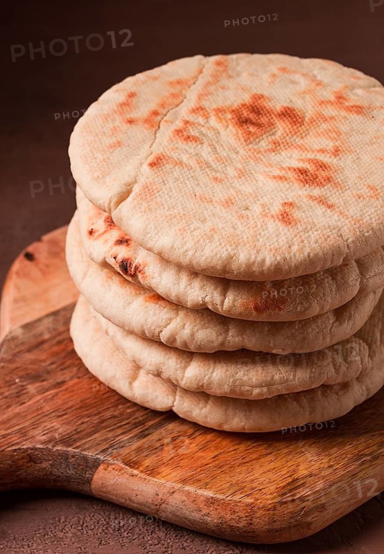 Pita bread, stack, on the table, no people