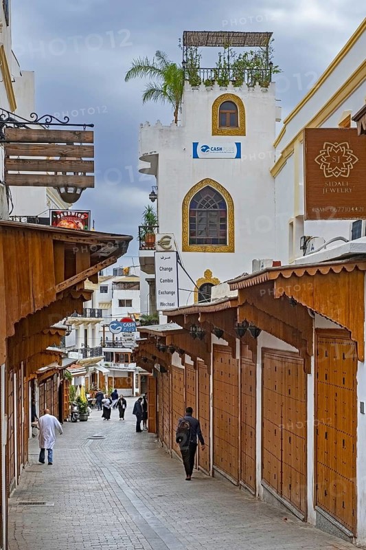 Wooden shutters of closed shops in shopping street on Friday in medina of the city Tangier, Tanger, Morocco