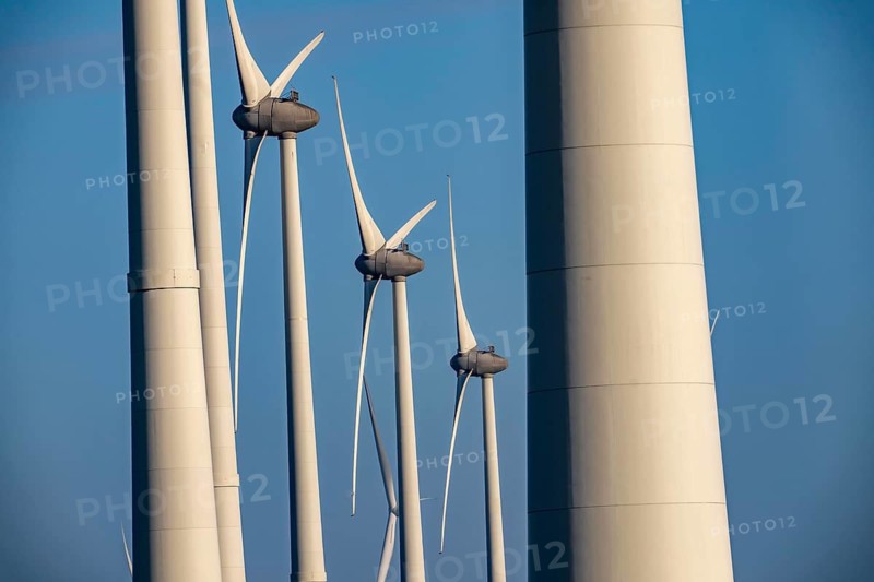 Wind farm in the north of the Netherlands, near Eemshaven, energy center, in addition to wind energy, there are coal and gas power plants and various energy infrastructure facilities here, Netherlands