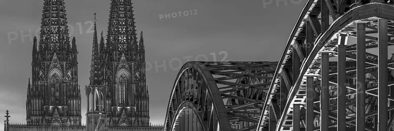 Evening atmosphere, Cologne Cathedral illuminated with LED lamps and the Hohenzollern Bridge, Cologne, North Rhine-Westphalia, Germany