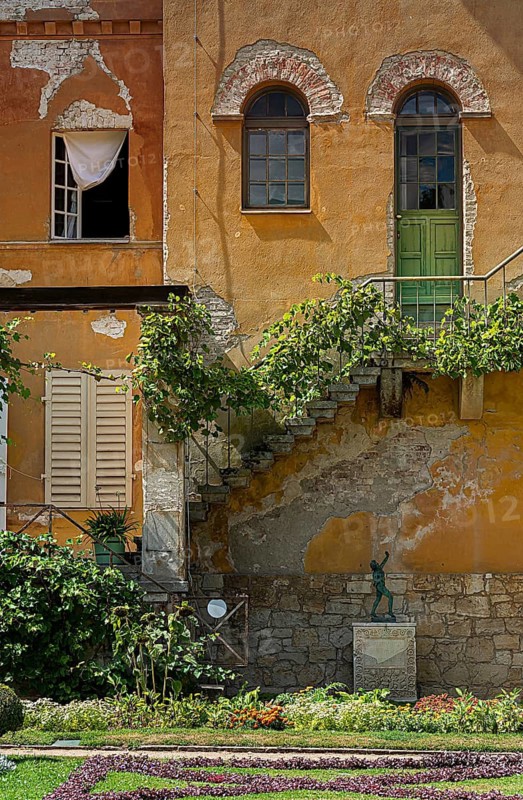House facade of an old villa at the Roman Baths in Sanssouci Park in Potsdam, Brandenburg, Germany