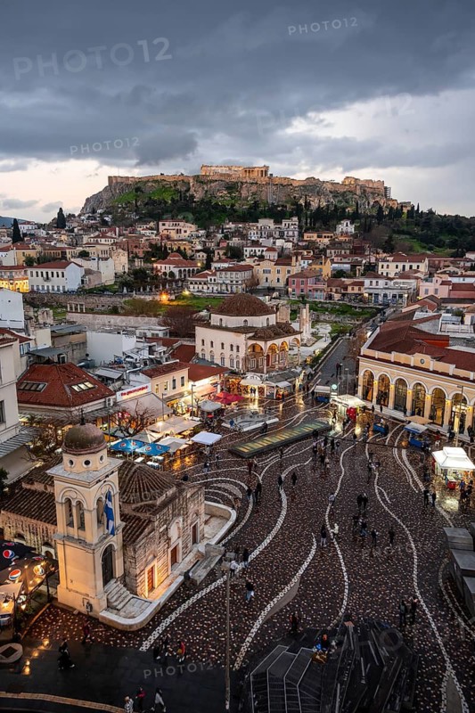View over the old town of Athens, with Panagia Pantanassa Church, Tzisdarakis Mosque and Acropolis, illuminated Monastiraki Square, Athens, Attica, Greece