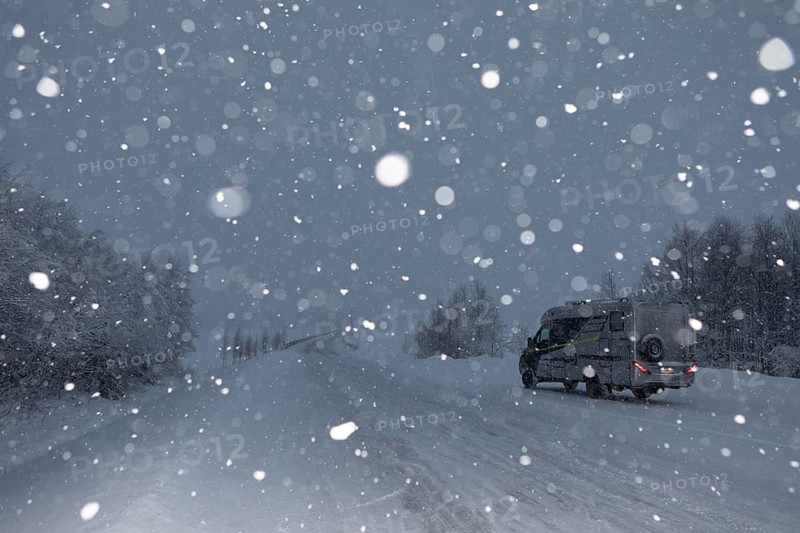 Motorhome in winter when it snows, Finland