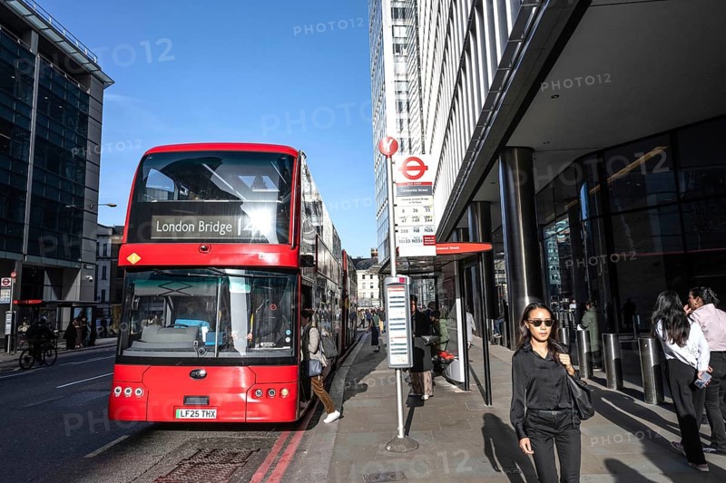 London, UK. February 25th 2026. A typical London red double decker bus heading towards London Bridge, in a busy central London business district, UK
