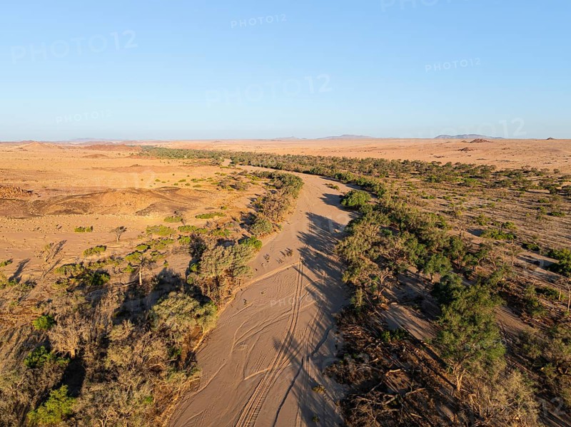 Aerial view, dry riverbed and desert landscape at Ugab River, Erongo, Damaraland, Namibia
