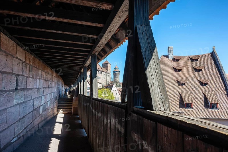 View from the rampart of the historic city wall to the Kaiserburg with the Sinwell Tower and Heidenturm in the old town of Nuremberg, Middle Franconia, Franconia, Bavaria, Germany