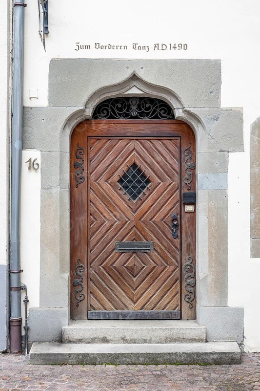 Artfully decorated wooden door with geometric pattern in the historic old town of Constance, traditional craftsmanship, Konstanz district, Baden-Württemberg, Germany