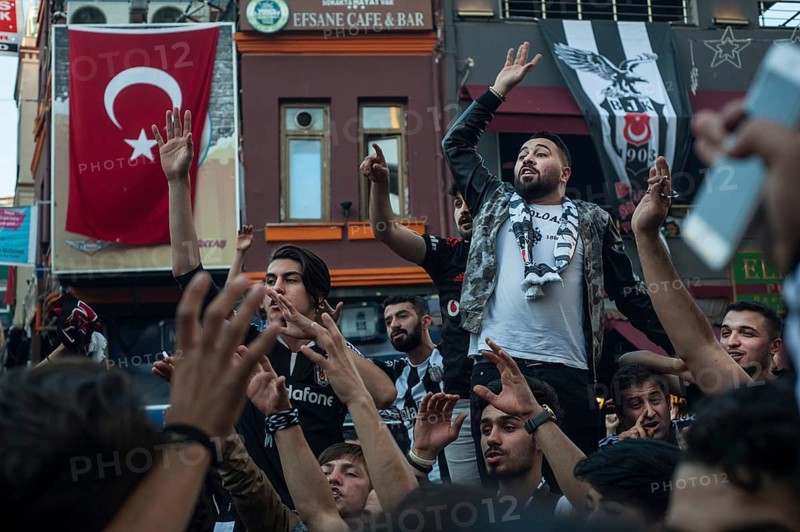Istanbul, Turkey, May 8th 2016 Besiktas Carsi football supporters singing songs before a match in Istanbul, Turkey