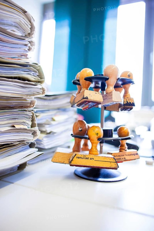 Pile with court files at the local court, stamp carousel with stamp announced on, symbolic image, Düsseldorf, Germany