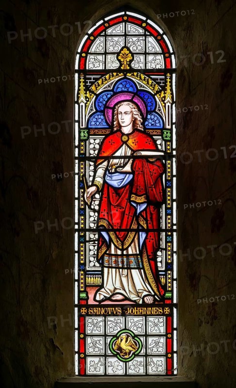 Stained glass window of Saint John by Horwood 1878, church of Saint Mary the Virgin, Silchester, Hampshire, England, UK