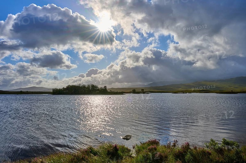 Tranquil landscape with a sunny, partly cloudy sky over a lake, Rannoch Moor, Bridge of Orchy, Scotland, United Kingdom, Great Britain