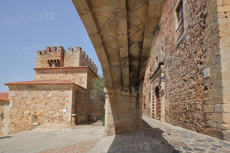 Arco de la Estrella, view from below, archway with city wall, UNESCO old town, Caceres, Extremadura