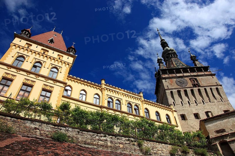 Romania, hour tower and cultural house in the historic old town of Sighisoara, German Sighisoara, town in Mures district in Transylvania, UNESCO World Heritage Site