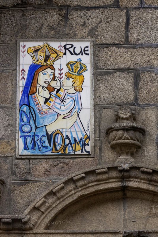 Artistically designed sign in the Rue Notre Dame, Guingamp, Département Côtes-d'Armor, Brittany, France