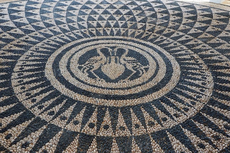 Artistic mosaic of pebbles with geometric patterns in a large circle, Kalithea, Kallithea, thermal baths, spa, Rhodes, Dodecanese, Greek Islands, Greece
