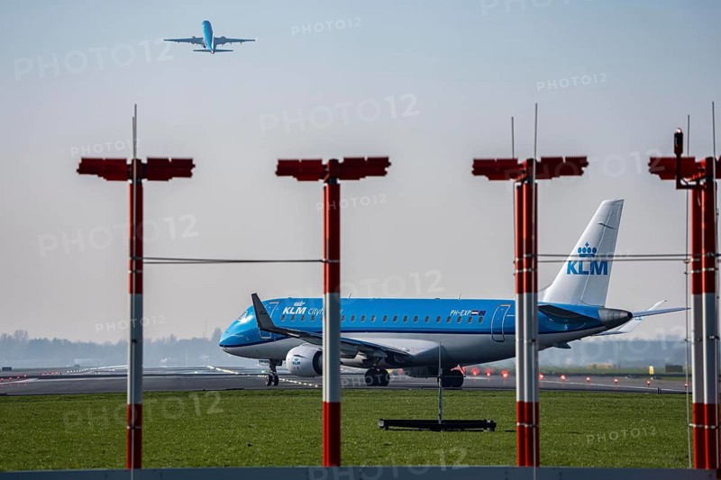 Amsterdam Schiphol Airport, Aalsmeerbaan runway, 18L-36R, KLMflieger on the runway, waiting for take-off, other aircraft taking off, Netherlands