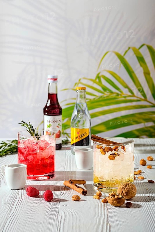 April 24, 2019, Minsk, Belarus, refreshing espresso and tonic summer drinks on white table under hard sulight