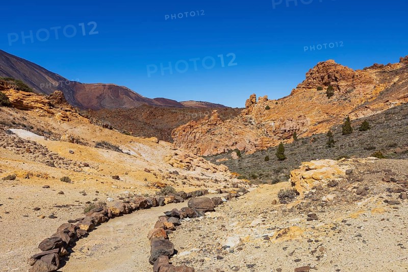 Mountain hiking on Montana Guajara, Canada del Capricho rock formation, Teide National Park, Tenerife, Canary Islands, Spain
