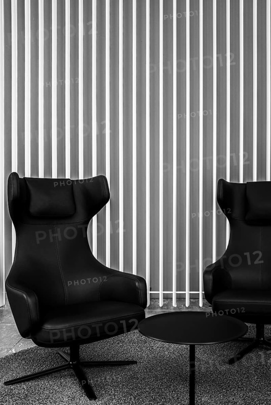 Black leather armchairs in the foyer, Berlin, Germany