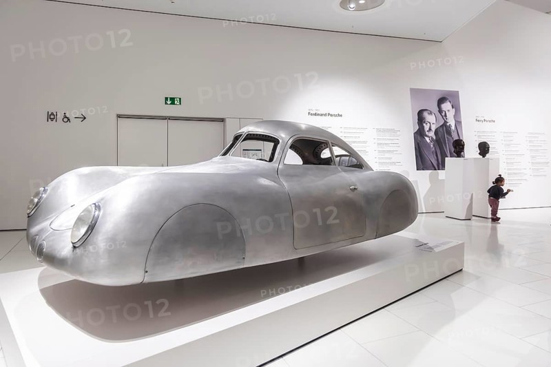 Porsche Museum Stuttgart. The Porsche Type 64, built in 1939, is the forefather of all Porsche sports cars. Ferdinand Porsche, Ferry Porsche. Busts of legendary designers. The automotive museum of Dr. Ing. h.c. F. Porsche AG shows racing cars and iconic cars from automotive history. interior view. Zuffenhausen, Stuttgart, Baden-Württemberg, Germany