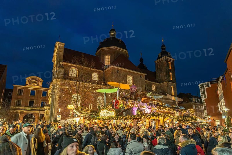 Christmas market at the Dominican Church at dusk, Münster, North Rhine-Westphalia, Germany