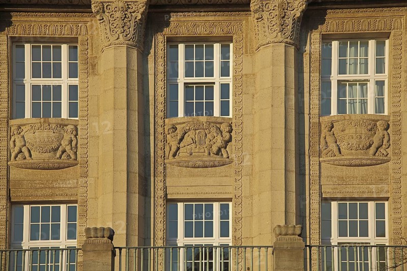 House façade with reliefs and columns with channels, detail, yellow sandstone, Kaiser-Friedrich-Bad, Wiesbaden, Taunus, Hesse, Germany