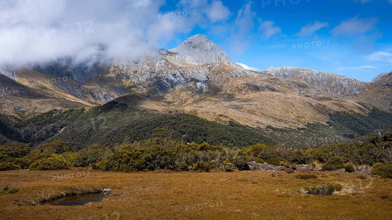 Mountain landscape in New Zealand on the Key Summit Track hiking trail. Fiordland National Park, Southland Region, South Island, New Zealand